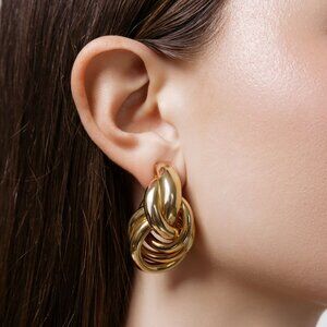 SHASHI Genevieve Earring in Gold twist large stud dangle clip on